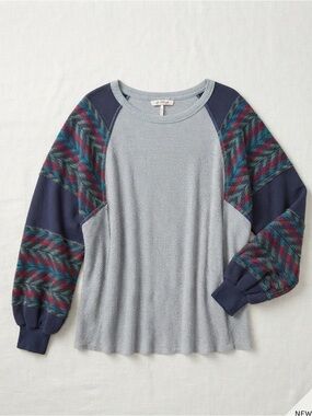 Light Blue Waffle-Knit Sweater with Patterned Navy Sleeves